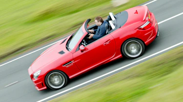 Mercedes SLK55 AMG red side profile