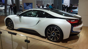 BMW i8 hybrid supercar white side profile