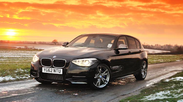 BMW M135i black five-door hatchback