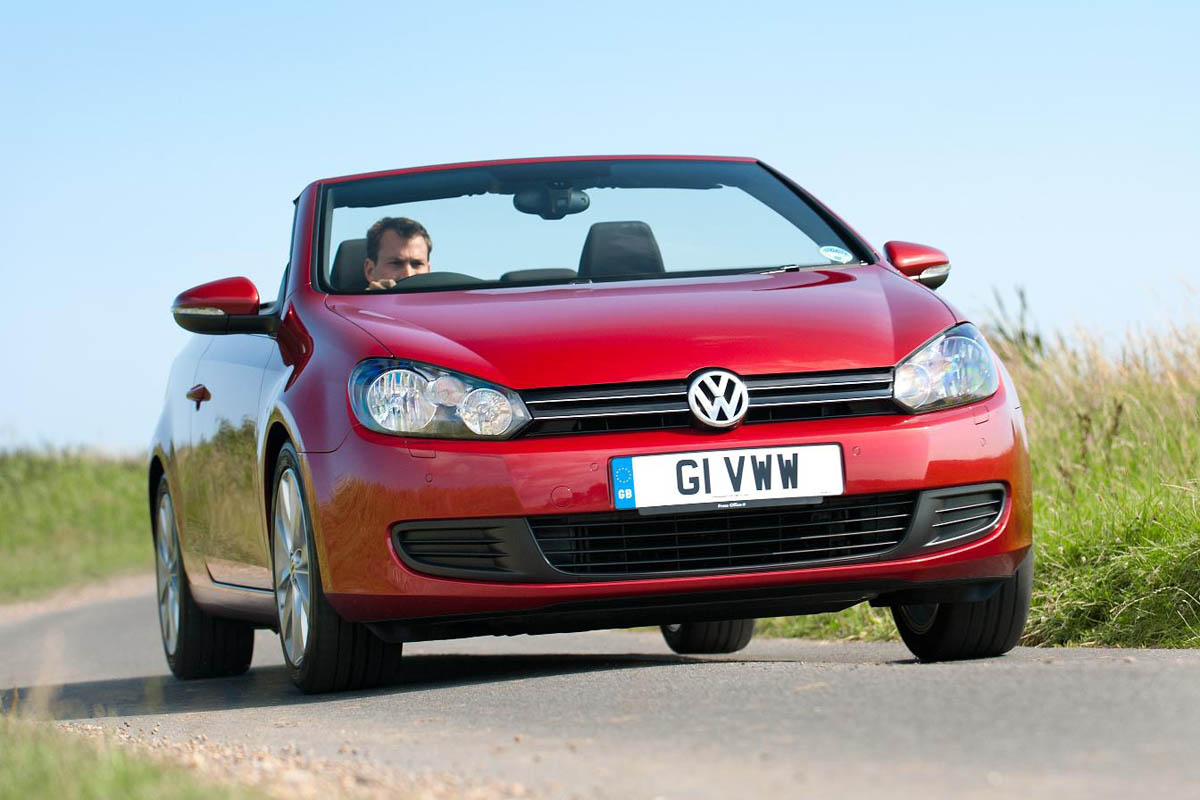 VW Golf TDI Cabriolet red roof down