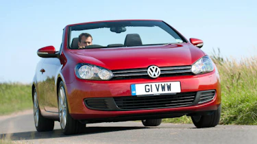 VW Golf TDI Cabriolet red roof down