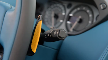 Aston Martin Vanquish Volante yellow leather paddle shifter