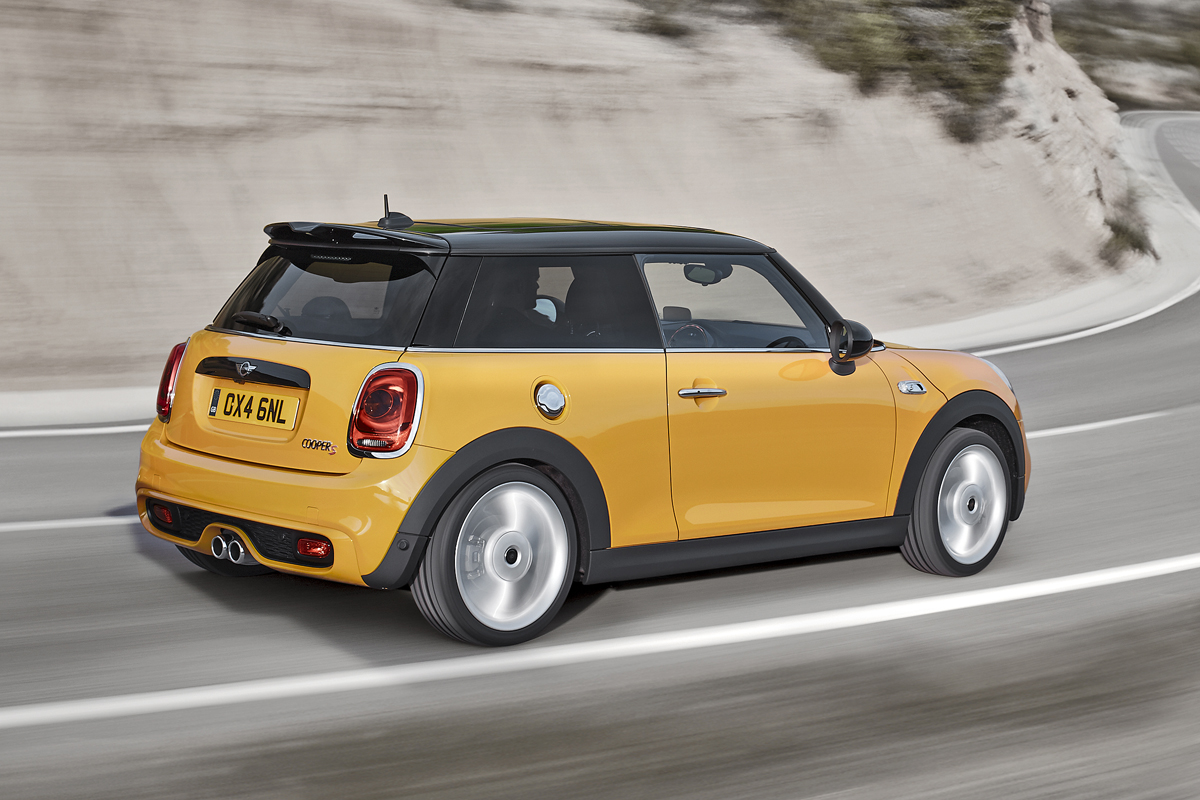 2014 Mini Cooper S yellow driving