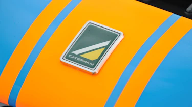 Caterham 620R badge Gulf stripes