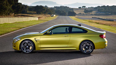 New BMW M4 yellow side profile
