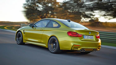 New BMW M4 yellow rear