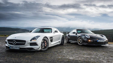 Porsche 911 GT2 RS v Mercedes SLS Black track video