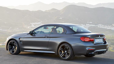 BMW M4 Convertible grey roof up closed