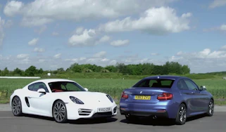Porsche Cayman v BMW M235i track battle