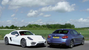 Porsche Cayman v BMW M235i track battle