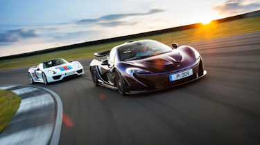 evo Magazine October 2014 - Porsche 918 v McLaren P1