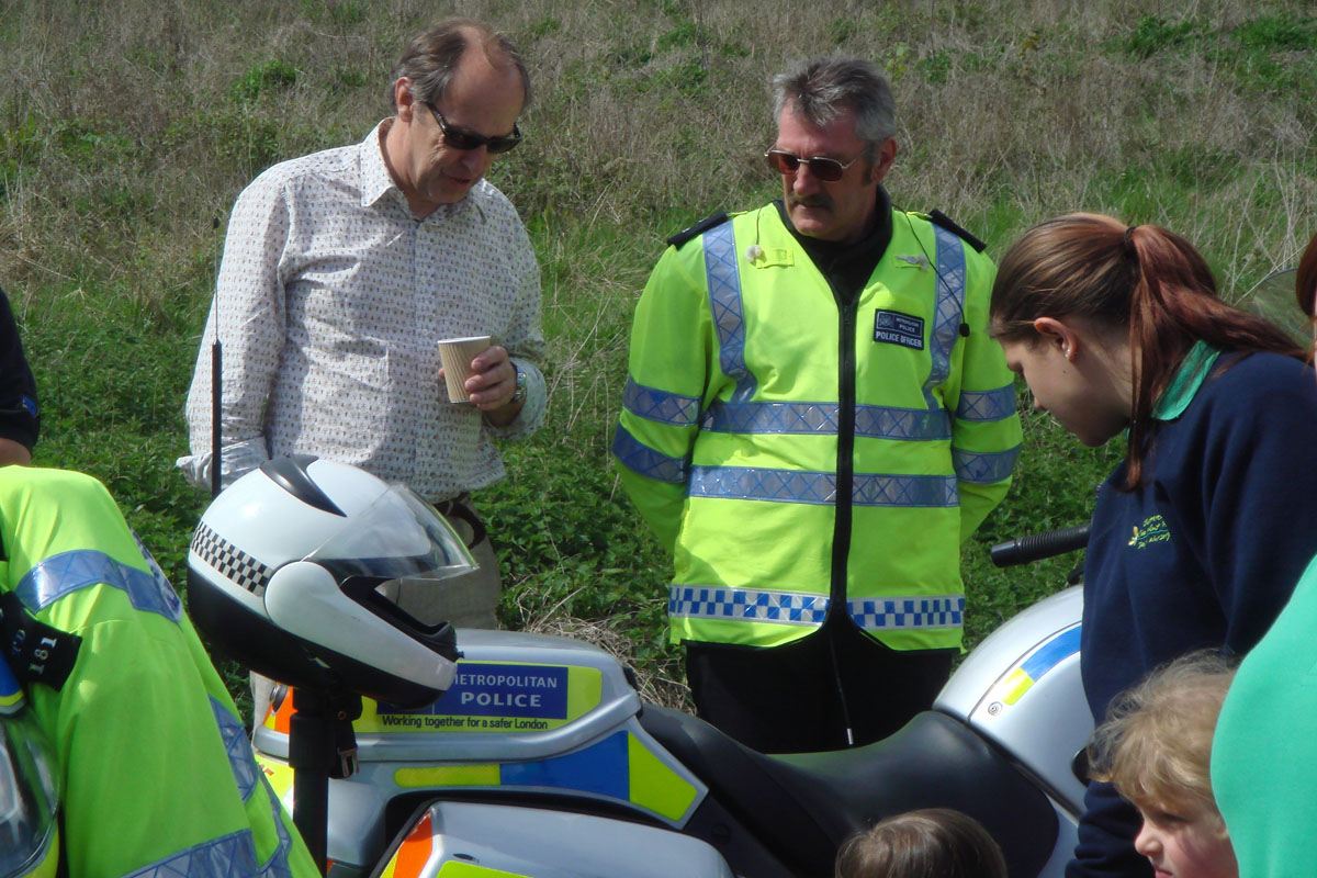 Harry chats up the escort
