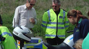 Harry chats up the escort