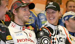 Michael Schumacher and Jenson Button