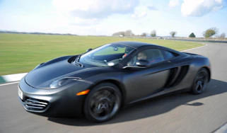 McLaren MP4-12C supercar by Button and Hamilton