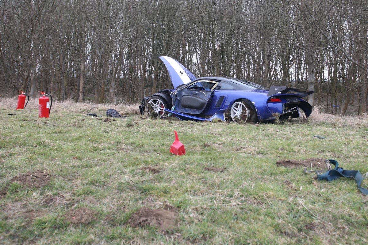 crashed 9ff GT9R with extinguishers