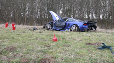 crashed 9ff GT9R with extinguishers