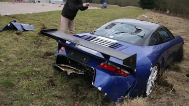 crashed 9ff GT9R rear with bloke