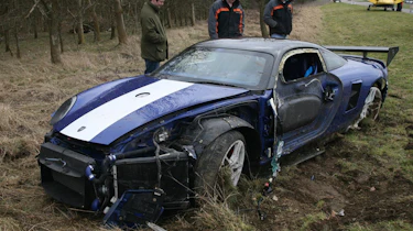crashed 9ff GT9R front with 3 blokes