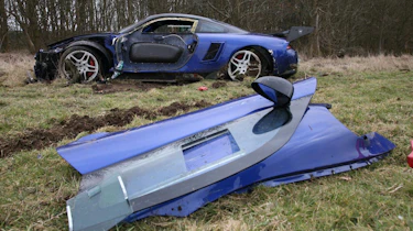 crashed 9ff GT9R with door
