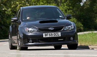 Subaru Impreza Cosworth CS400 road corner