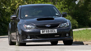 Subaru Impreza Cosworth CS400 road corner