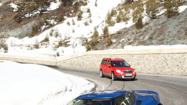 Skoda Yeti meets Lotus Evora in snow