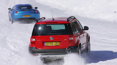 Skoda Yeti meets Lotus Evora in snow