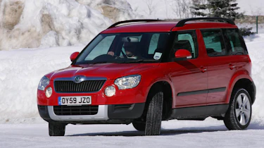 Skoda Yeti meets Lotus Evora in snow
