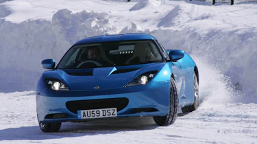 Skoda Yeti meets Lotus Evora in snow