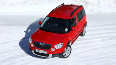 Skoda Yeti meets Lotus Evora in snow