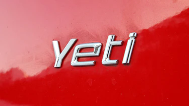 Skoda Yeti meets Lotus Evora in snow