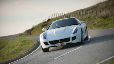 Mercedes SLS AMG v Ferrari 599, Porsche 911, Aston Martin, Audi R8 and Bristol Fighter