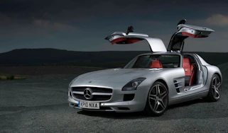 Mercedes SLS AMG v Ferrari 599, Porsche 911, Aston Martin, Audi R8 and Bristol Fighter