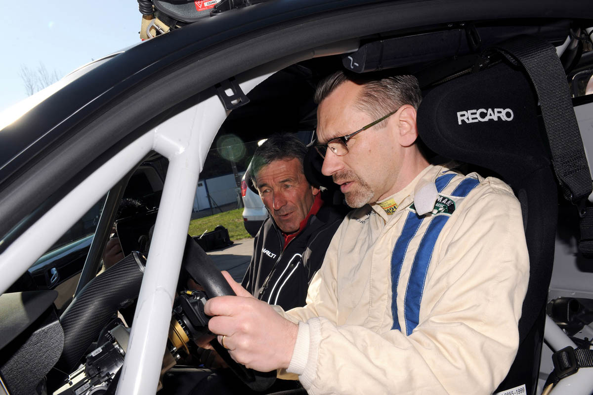 evo races an Audi R8 LMS at the Nurburgring 24 hours