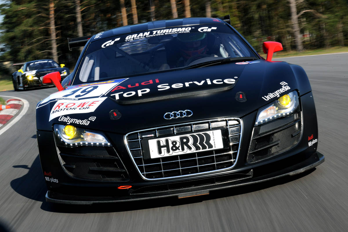 evo races an Audi R8 LMS at the Nurburgring 24 hours
