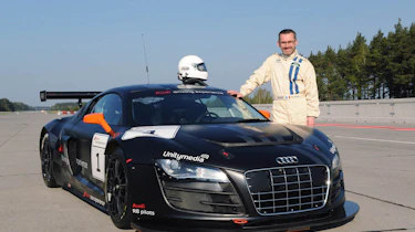 evo races an Audi R8 LMS at the Nurburgring 24 hours