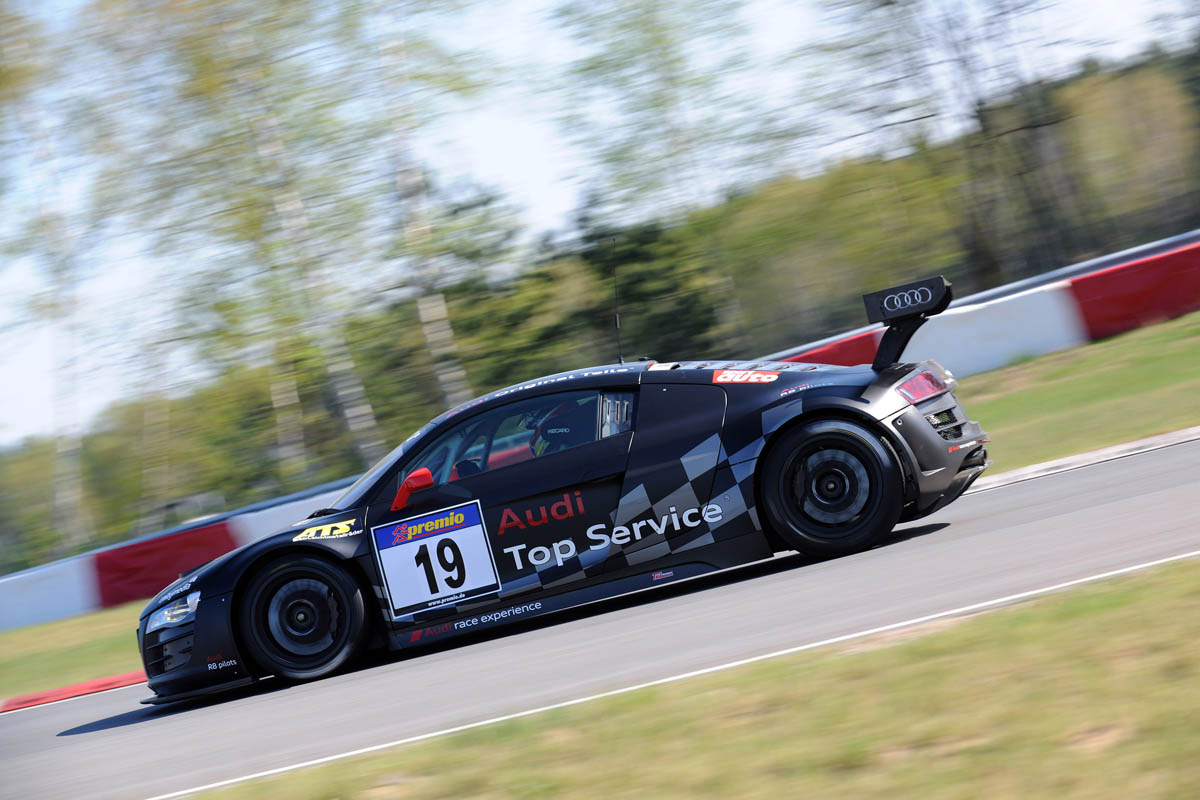 evo races an Audi R8 LMS at the Nurburgring 24 hours