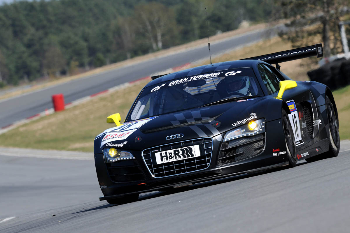 evo races an Audi R8 LMS at the Nurburgring 24 hours