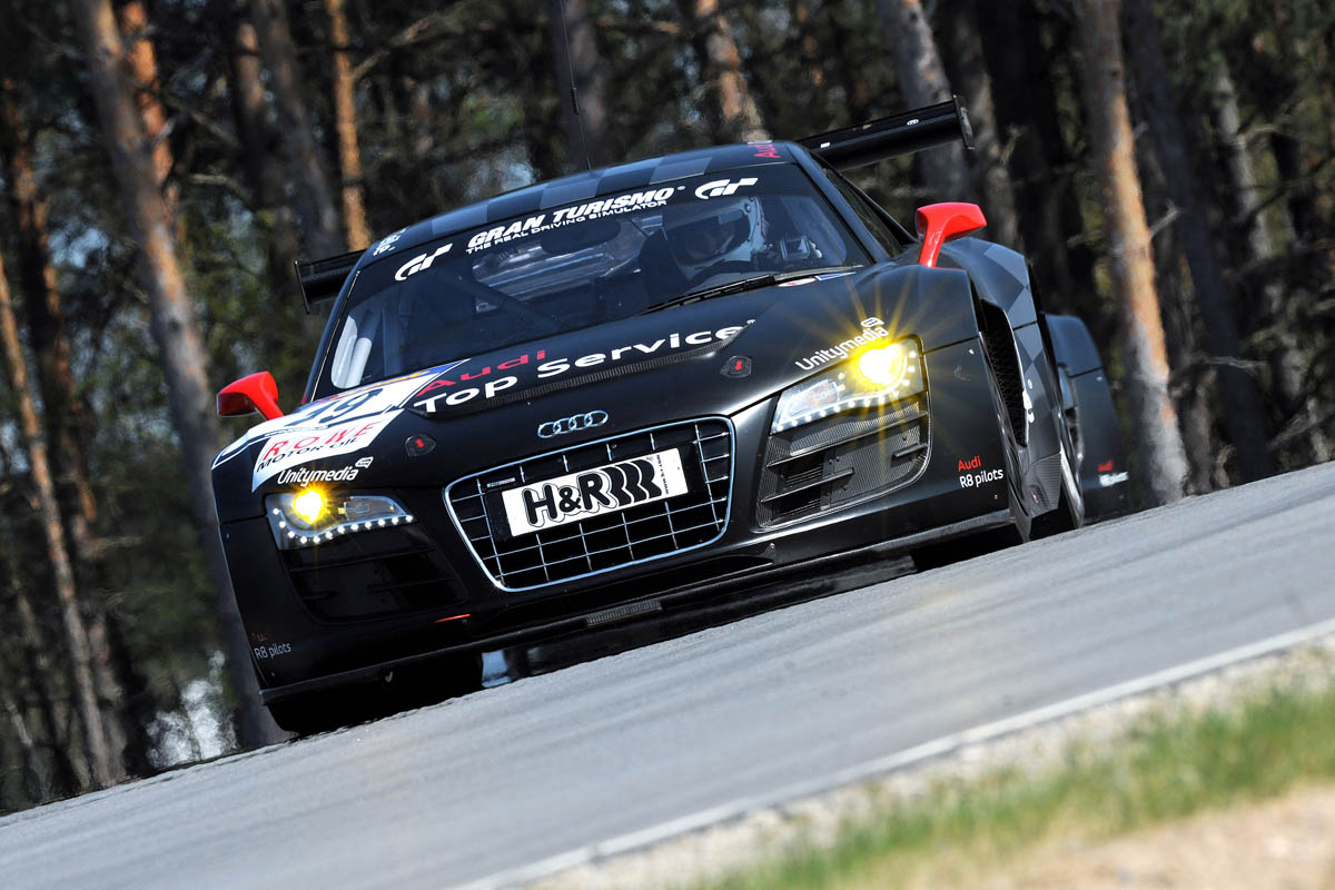 evo races an Audi R8 LMS at the Nurburgring 24 hours