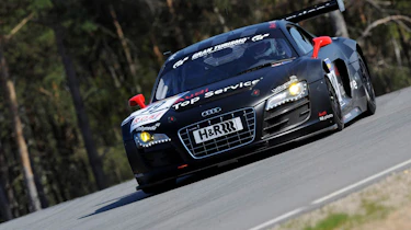 evo races an Audi R8 LMS at the Nurburgring 24 hours