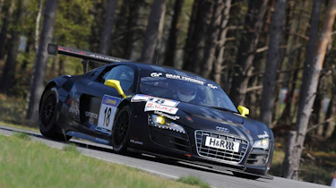 evo races an Audi R8 LMS at the Nurburgring 24 hours