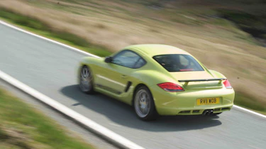 BMW 1-series M Coupe v Porsche Cayman R video review