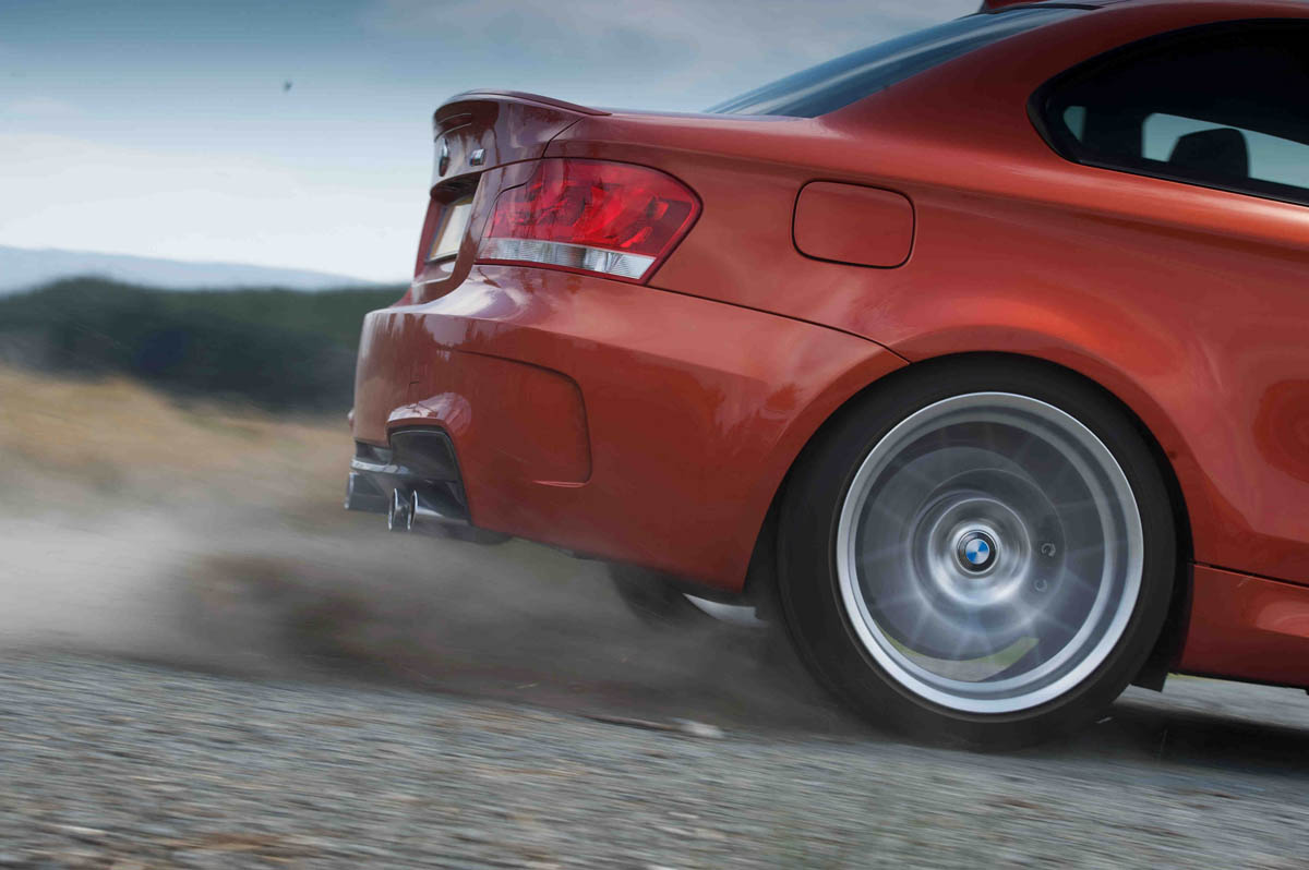 BMW 1-series M Coupe v Porsche Cayman R video review