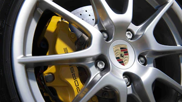 BMW 1-series M Coupe v Porsche Cayman R video review