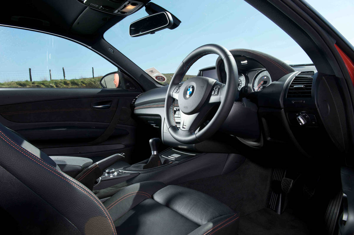 BMW 1-series M Coupe v Porsche Cayman R video review