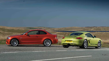 BMW 1-series M Coupe v Porsche Cayman R video review