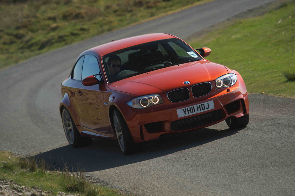 BMW 1-series M Coupe v Porsche Cayman R video review