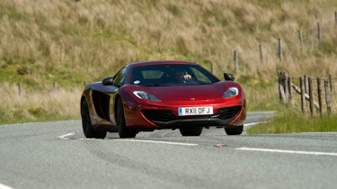 Ferrari 458 Italia beats McLaren MP4-12C