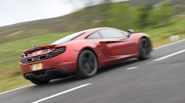 Ferrari 458 Italia beats McLaren MP4-12C